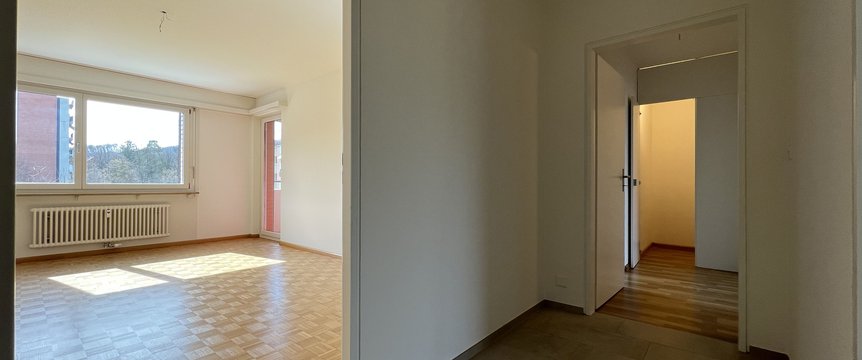 Korridor / Eingang mit Wohnzimmer
(Beispielfoto aus baugleicher Wohnung, kleinere Abweichungen sind möglich)